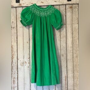 Green dress with smocked pearls